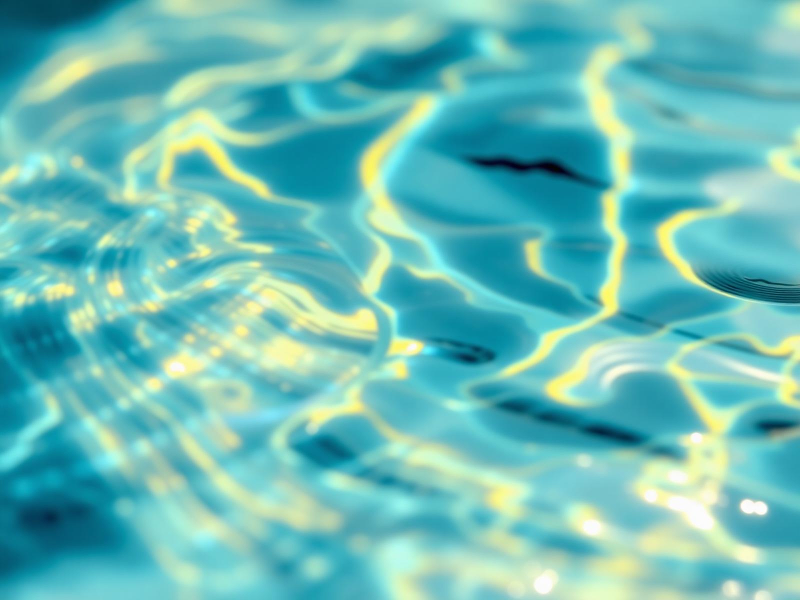 Sunlit water detail of a perfectly balanced pool